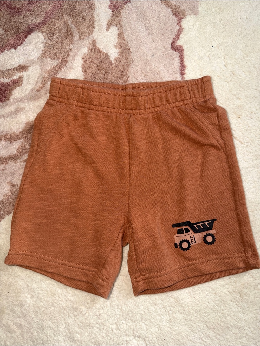 Pekkle Kids Rust Orange Shorts with Dump Truck Detail